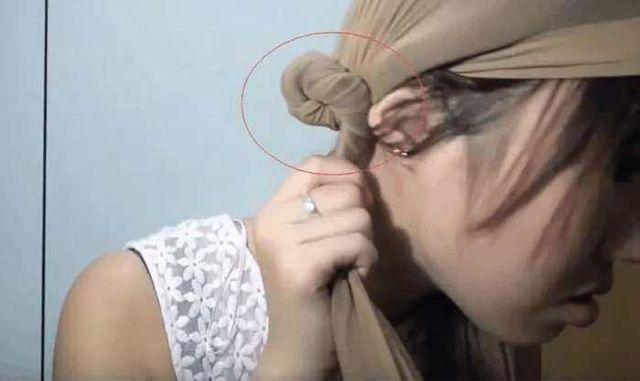 美女将丝袜套头上10分钟,拿下来之后,再也不去理发店了