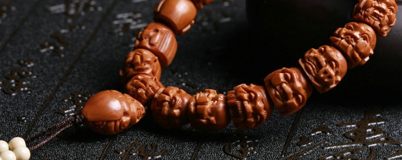 橄榄核多长时间能包浆(橄榄核一般多久变红)